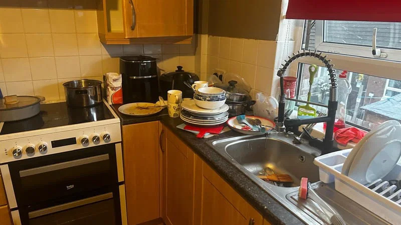 Kitchen worktop before cleaning and decluttering