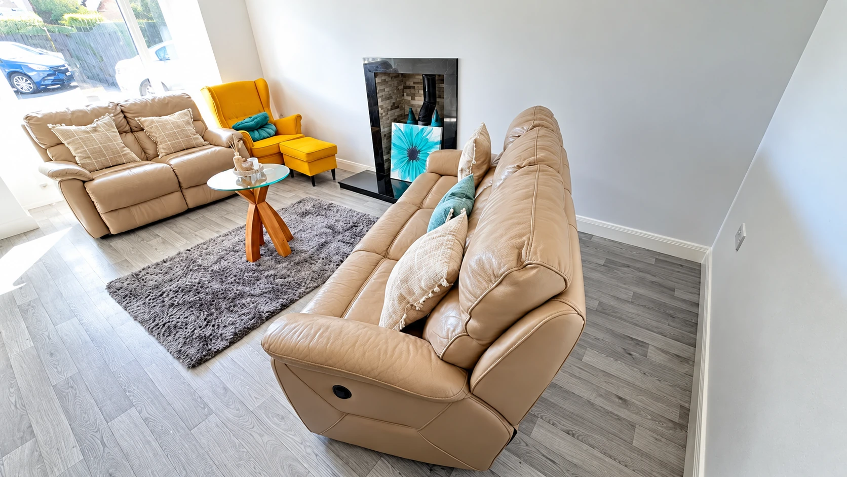 High-resolution AI recreation of the original living room, with beige sofas and a yellow armchair
