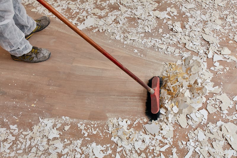 Sweeping dust and debris after building work